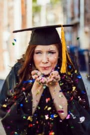 Woman in cap and gown graduation