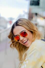 Woman outside wearing sunglasses