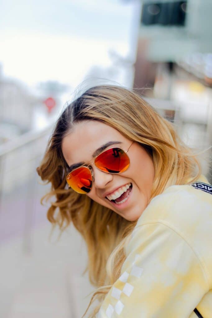 Woman outside wearing sunglasses