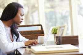 Woman looking at a laptop