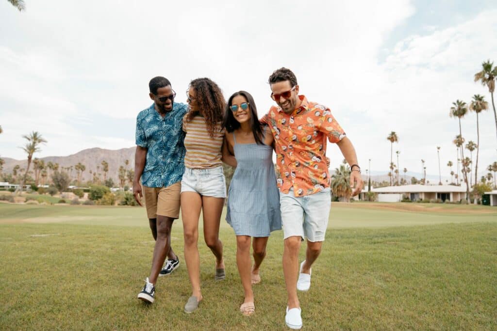 Happy people walking together outside