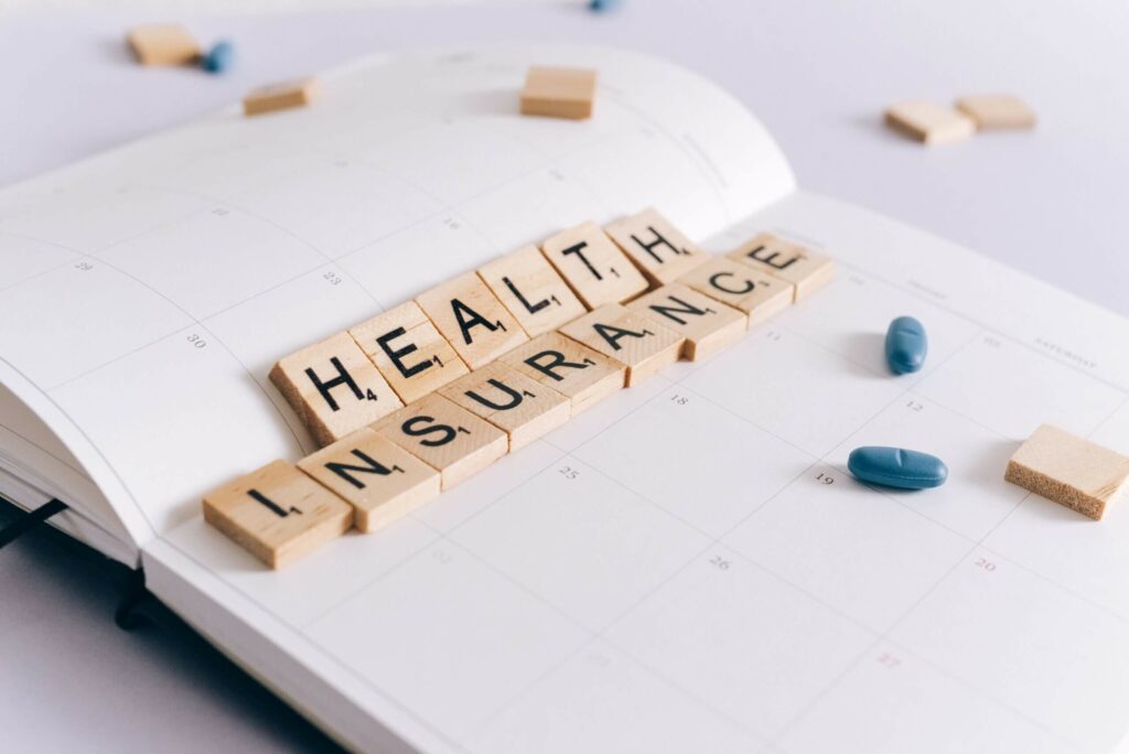 Health Insurance in scrabble letters